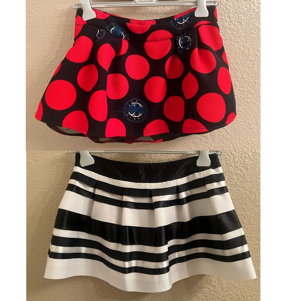 Two Sz.2/4 skirts with built in shorts